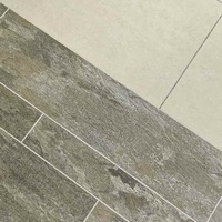Виниловая плитка Camaro Stone уложенная с использованием пластиковых вставок Polyflor strip Виниловая плитка Camaro Stone уложенная с использованием пластиковых вставок Polyflor strip